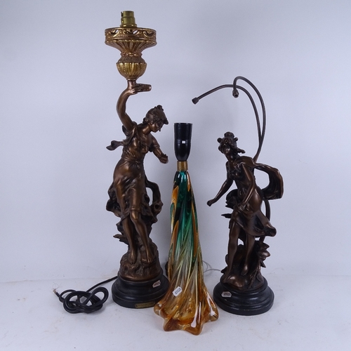 579 - 2 composition lamp bases supported by Classical figures, and a Murano coloured glass lamp base (3)