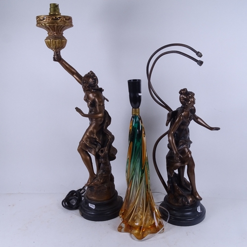 579 - 2 composition lamp bases supported by Classical figures, and a Murano coloured glass lamp base (3)