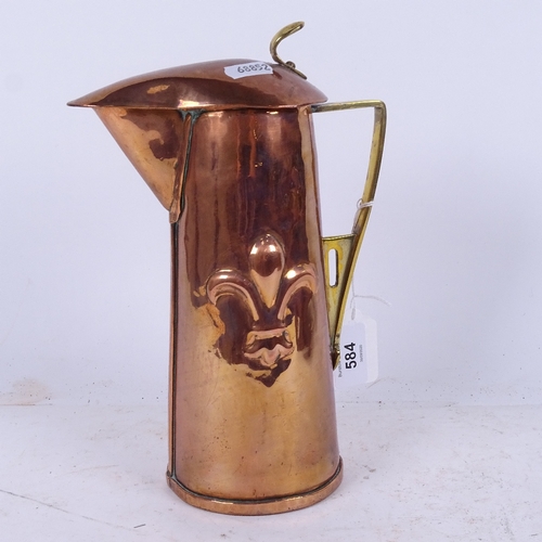 584 - An Art Nouveau copper and brass water jug, circa 1910, height 24cm