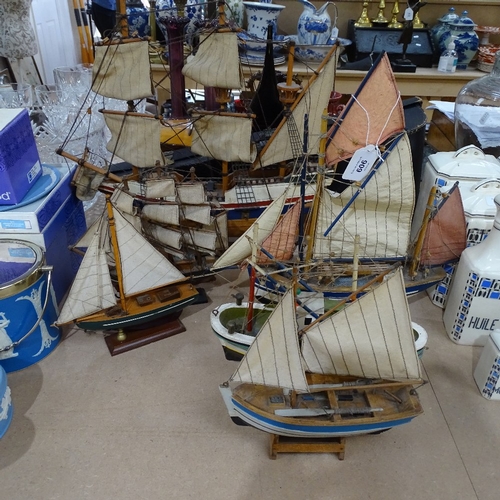 606 - A painted wood model of the Golden Hind, height 44cm, and 5 other models of sailing ships and boats