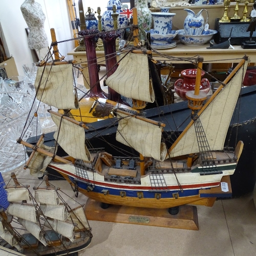 606 - A painted wood model of the Golden Hind, height 44cm, and 5 other models of sailing ships and boats