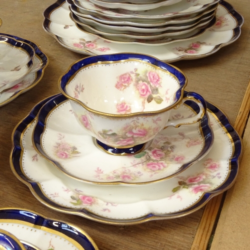 65 - A Crescent & Sons China tea and cake service for 9, including tea cups, saucers and cake plates, sau... 