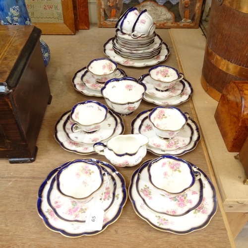 65 - A Crescent & Sons China tea and cake service for 9, including tea cups, saucers and cake plates, sau... 