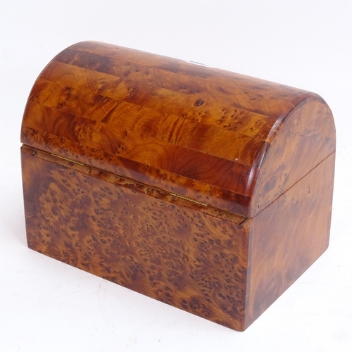 66 - A modern birdseye maple dome-top tea caddy, and a mahogany dome-top mantel clock, working order, cad... 