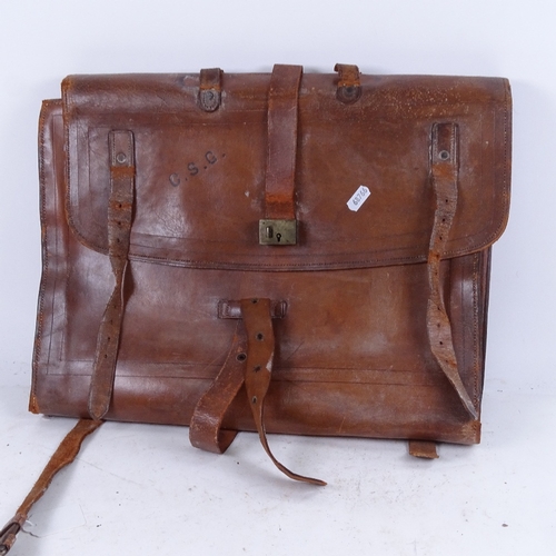 660 - An Egyptian Army leather case, with sectioned and pocket fitted interior, 43cm across