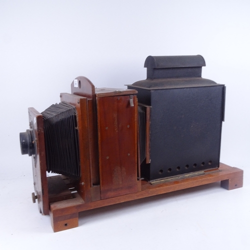 678 - An Edwardian mahogany magic lantern