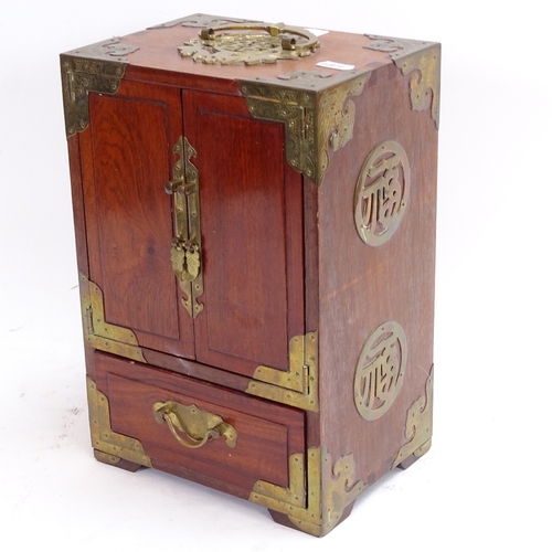 75 - A reproduction Oriental brass-bound hardwood table-top jewel cabinet, height 30cm