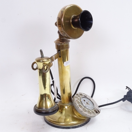 77 - A Vintage brass candlestick dial telephone, height 31cm