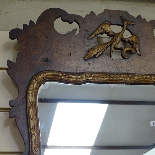 761 - An Antique walnut-framed mirror, with Griffon figure decoration, height 92cm