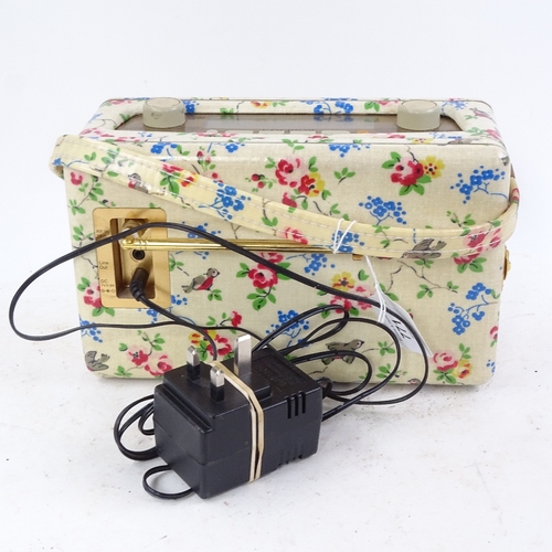 771 - A floral-cased Roberts portable radio