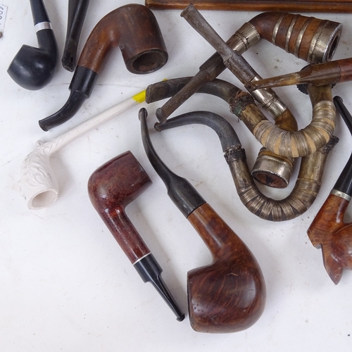 780 - A smoker's stand and assorted pipes