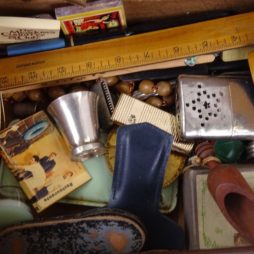 795 - A small suitcase with cigarette case, hand warmer, dominoes, beads etc