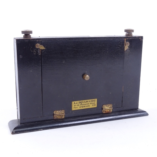 935 - An Edwardian ebony and silver plated desk calendar