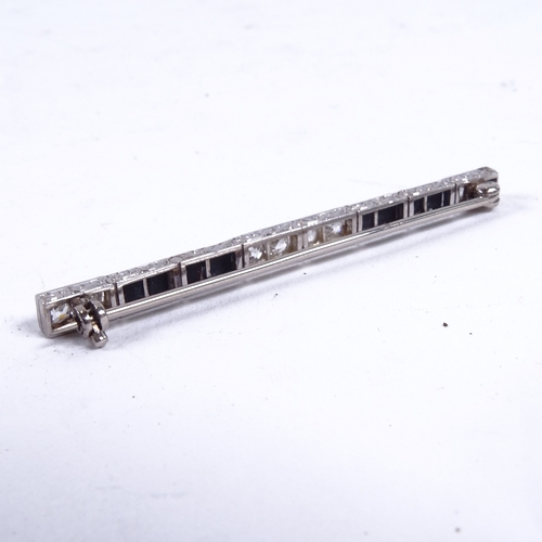 957 - An Art Deco design platinum and diamond set bar brooch