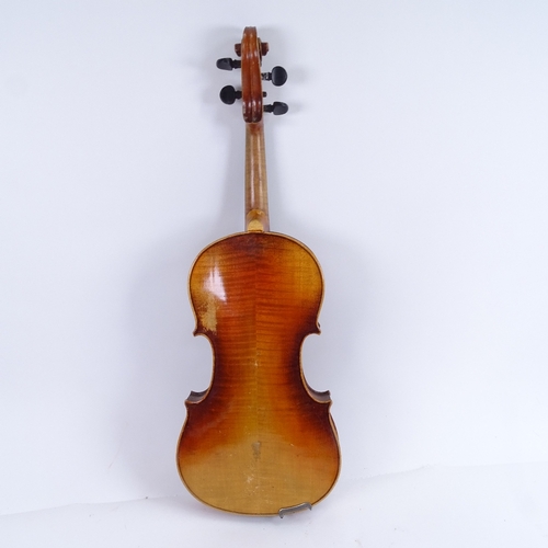 311 - An early/mid-20th century Stradivarius copy violin and bow, in hardshell case, violin length 60cm