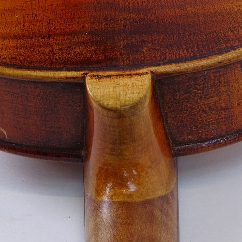 311 - An early/mid-20th century Stradivarius copy violin and bow, in hardshell case, violin length 60cm