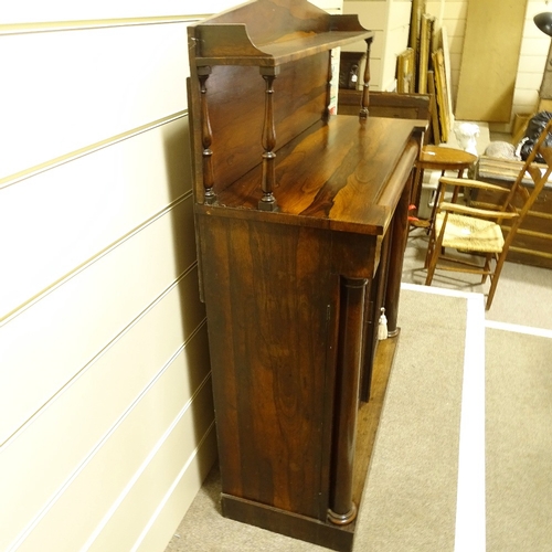 466 - A 19th century rosewood chiffonier, with raised shelved back, single frieze drawer and turned column... 