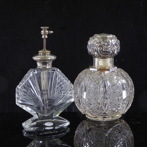 112 - An Art Deco cut-glass silver-topped atomiser scent bottle, and a Victorian cut-glass scent bottle, w... 