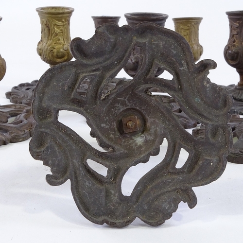 119 - A set of 8 French patinated bronze candlesticks, late 19th/early 20th century, height 9cm, base diam... 