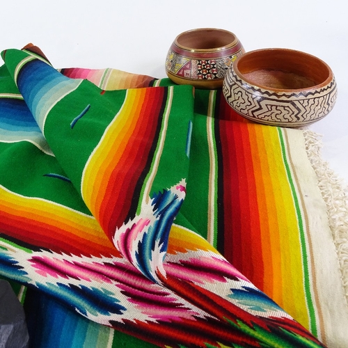 120 - A large hand woven Mexican Saltillo Serape (blanket), a carved and painted wood mask, a pair of pain... 