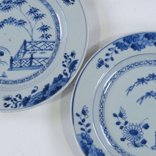 129 - A pair of Chinese blue and white porcelain plates, hand painted bamboo designs, diameter 23cm