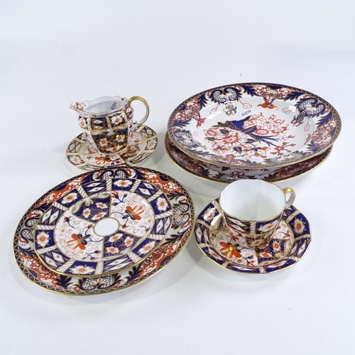 146 - A quantity of Royal Crown Derby Imari pattern tea and dinnerware