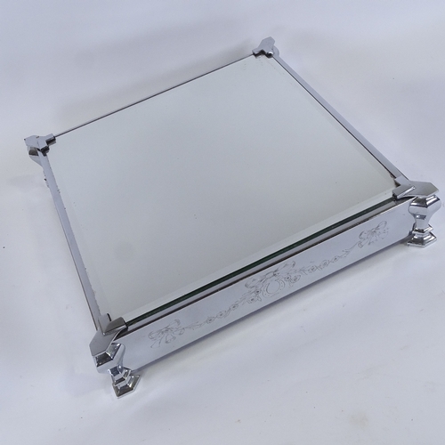 147 - A fine quality mirror-topped square cake display stand, in engraved chrome plate surround, in origin... 