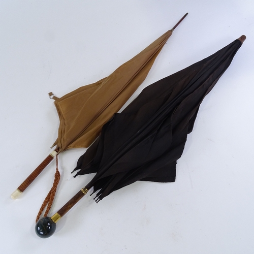 148 - A Vintage parasol with agate ball handle stamped Brigg, and a leather and ivory-handled parasol (2)