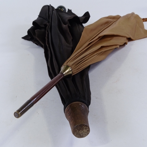 148 - A Vintage parasol with agate ball handle stamped Brigg, and a leather and ivory-handled parasol (2)