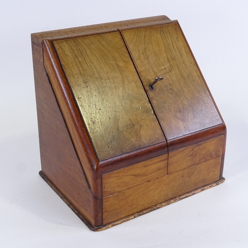 157 - A Victorian walnut slope-front stationery cabinet with perpetual calendar, width 32cm