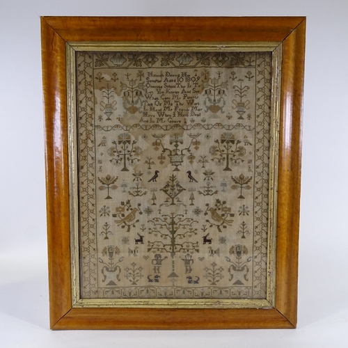 185 - A George III needlework sampler, by Hannah Deavill, aged 10, 1809, Onecote School, maple frame, over... 