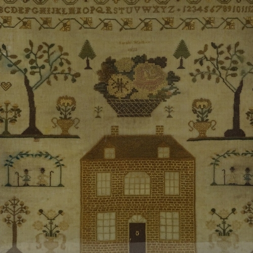 186 - Early 19th century needlework sampler on silk ground, by Sarah Walker, dated 1823, framed, overall f... 