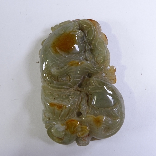 199 - A Chinese relief carved jade pendant, length 5.5cm