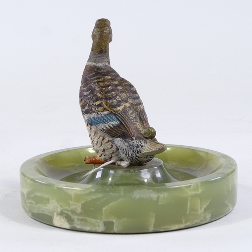 200 - An onyx dish surmounted by a cold painted bronze duck, diameter 12cm