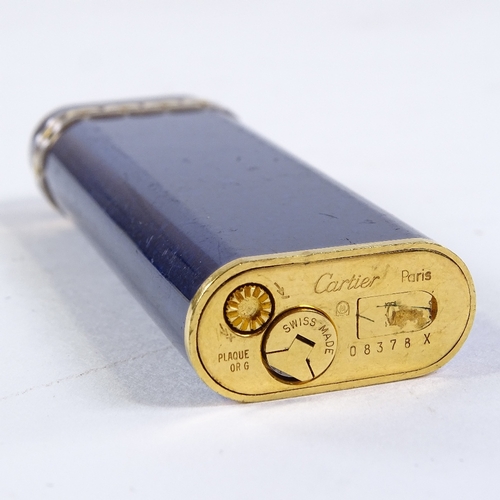 201 - A Cartier blue lacquer and gilt-metal pocket lighter