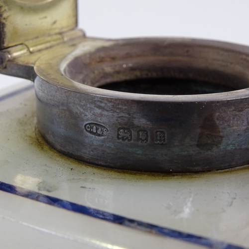 202 - An onyx and lapis inlaid inkwell with silver mount, width 7.5cm