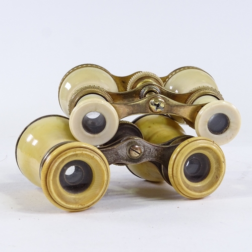 207 - 2 pairs of ivory-mounted opera glasses