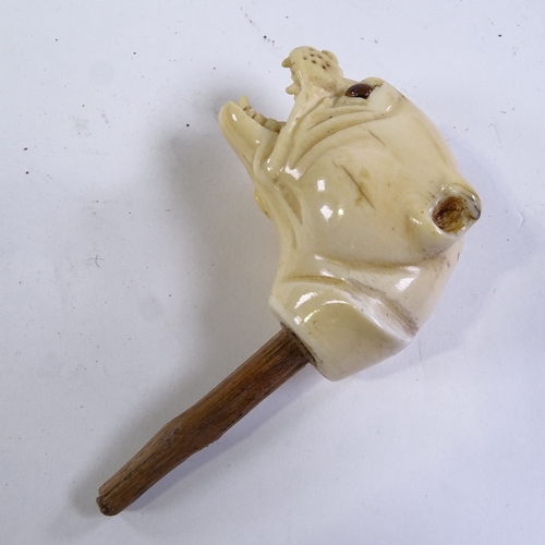 211 - A 19th century carved ivory Bulldog design walking stick handle, with glass eyes