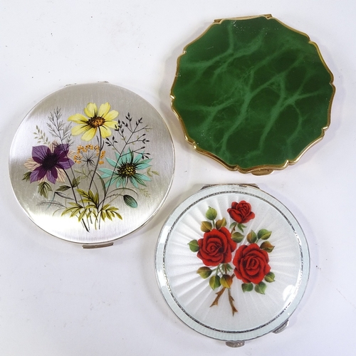 215 - A hallmarked silver and enamel compact, decorated with red roses, Birmingham 1957, diameter 7.5cm, a... 