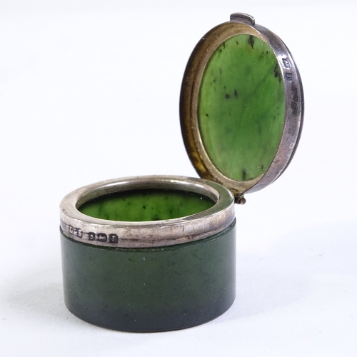 229 - A small polished nephrite circular pot, with silver mounts, diameter 3cm, hallmarks Birmingham 1916