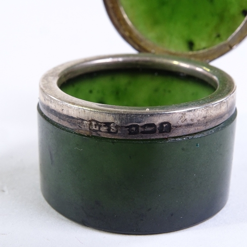 229 - A small polished nephrite circular pot, with silver mounts, diameter 3cm, hallmarks Birmingham 1916