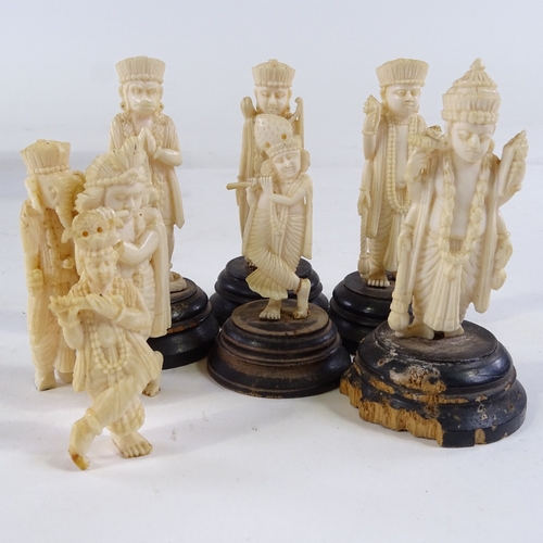 230 - A group of Indian carved ivory figures, some on wooden stands, height 8cm (8)