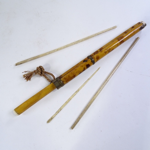 231 - An Oriental eating set, comprising knife and chopsticks, in tortoiseshell case, overall length 25cm