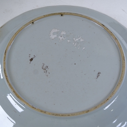 240 - A Chinese white glaze porcelain charger, with painted enamel flowers, diameter 38cm