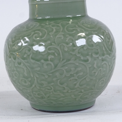 246 - A Chinese celadon glaze porcelain vase, relief moulded dragon design, with seal mark, height 27cm, r... 