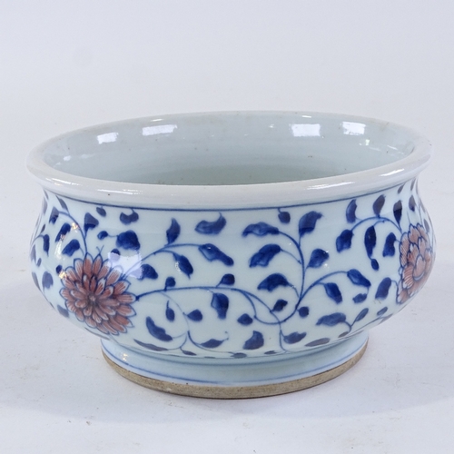 249 - A Chinese blue and white porcelain bowl, with red flowers, diameter 18cm, height 9.5cm