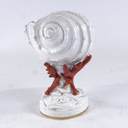 251 - A Copeland China nautilus shell design table centre, on coral design base, height 22cm