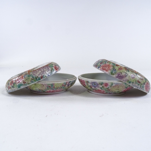 252 - A pair of Chinese porcelain circular pots, with painted birds and flowers, seal marks, diameter 10cm