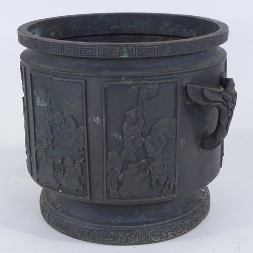 275 - A Chinese patinated bronze jardiniere, with relief moulded panels, rim diameter 26cm, height 24cm