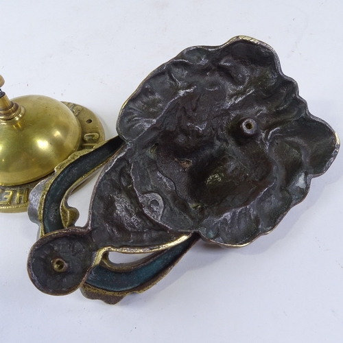 284 - A Henri Winterman's Cigars brass advertising desk bell, diameter 10.5cm, and a cast brass lion mask ... 